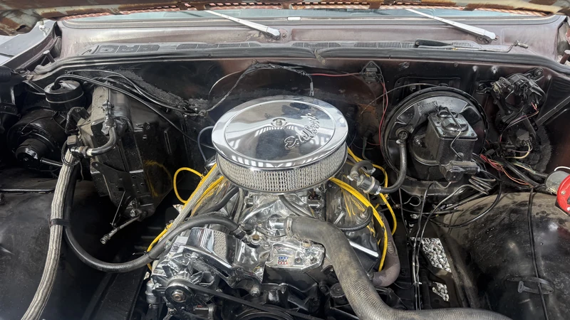 Engine bay of a car opened up for repair